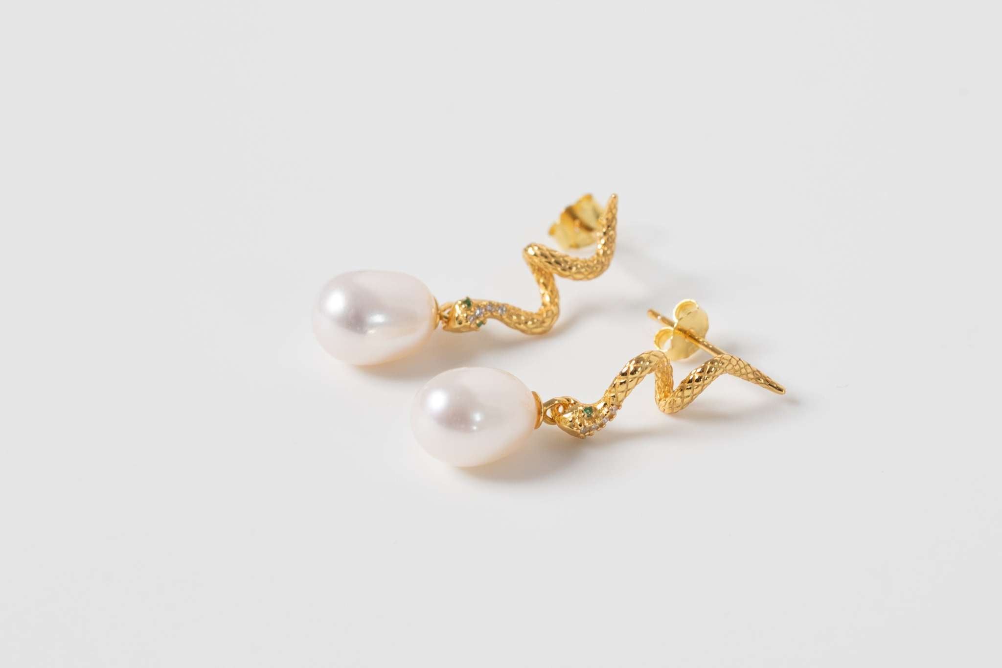 Lilith Pearl Drop Earrings with 7 mm freshwater pearls and gold plated .925 sterling silver setting