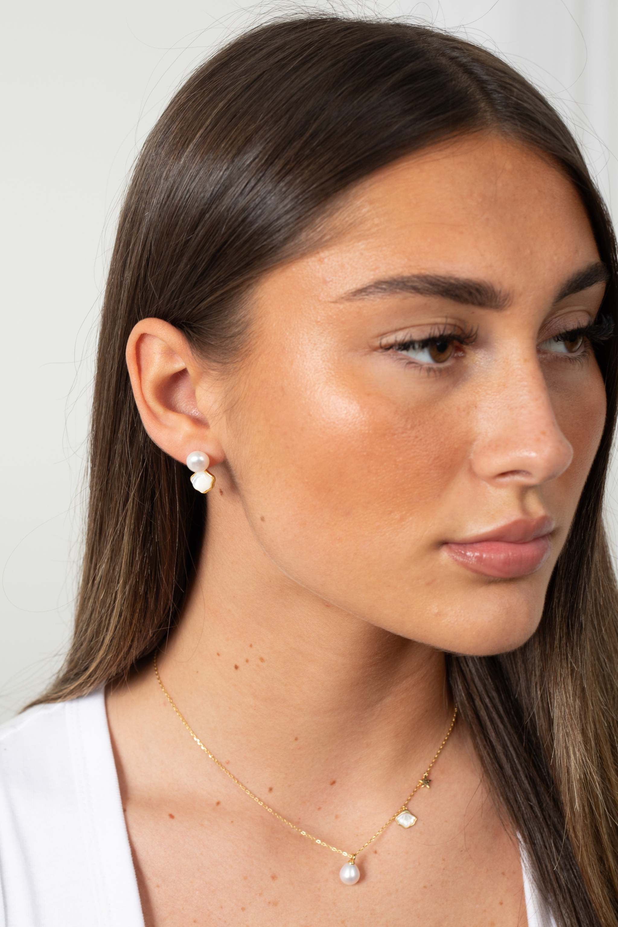 Shellora sterling silver shell earrings with luminous freshwater pearls