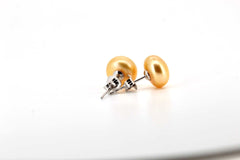 The Queen’s Glow Pearl Studs