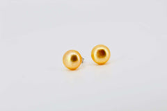 The Queen’s Glow Pearl Studs