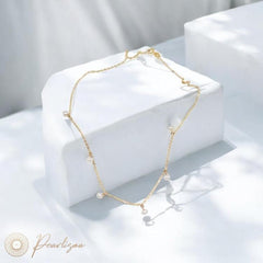 Side profile of model wearing Luna Perle freshwater pearl choker – elegant minimalist jewelry