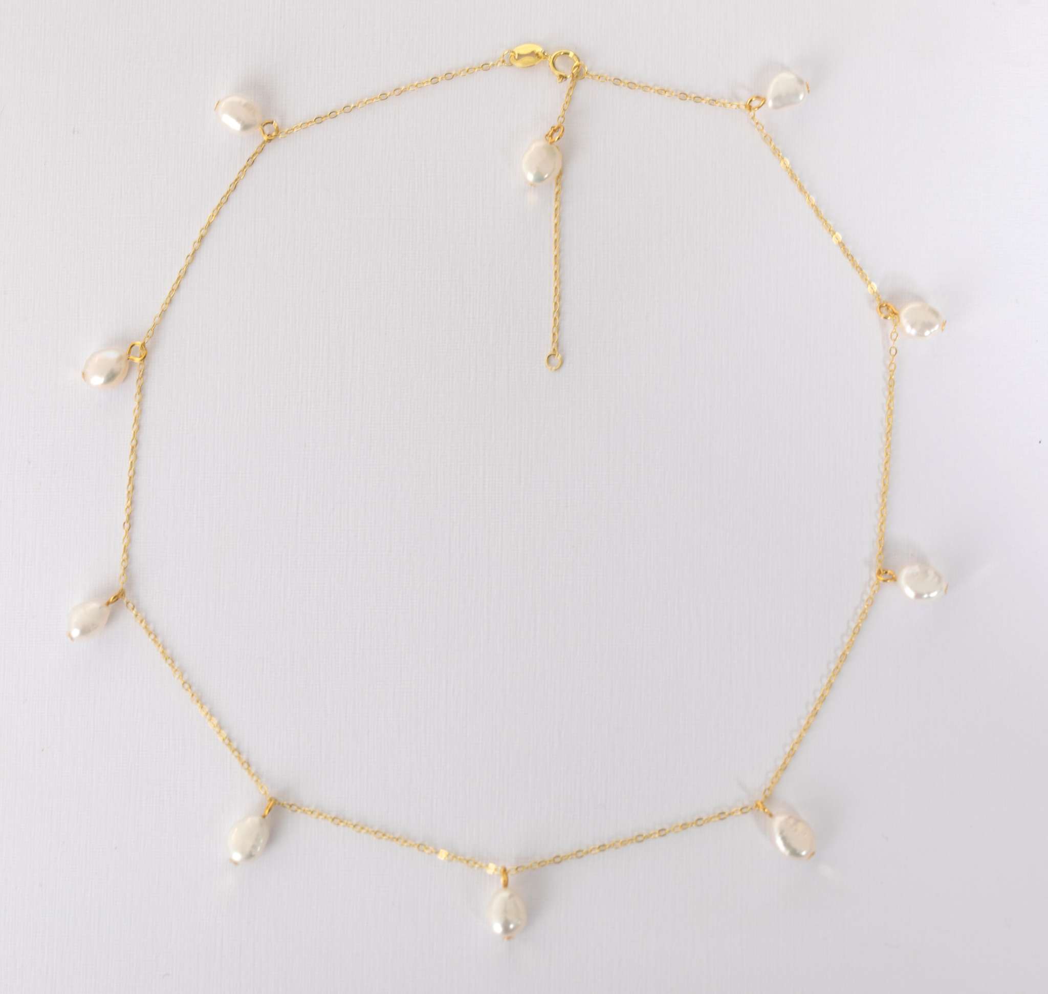 Close-up of Elisette Pearl Choker showcasing lustrous natural pearls on gold plated sterling silver