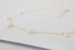 Close-up of Elisette Pearl Choker showcasing lustrous natural pearls on gold plated sterling silver