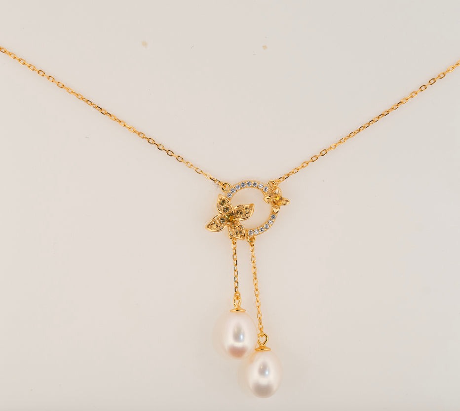 Fleur de Perle necklace and earrings with 7–8 mm freshwater pearls and yellow zircon stones in 18K gold plated sterling silver