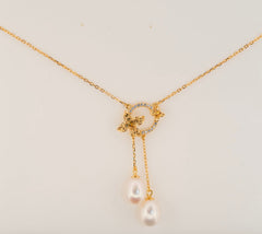 Fleur de Perle necklace and earrings with 7–8 mm freshwater pearls and yellow zircon stones in 18K gold plated sterling silver