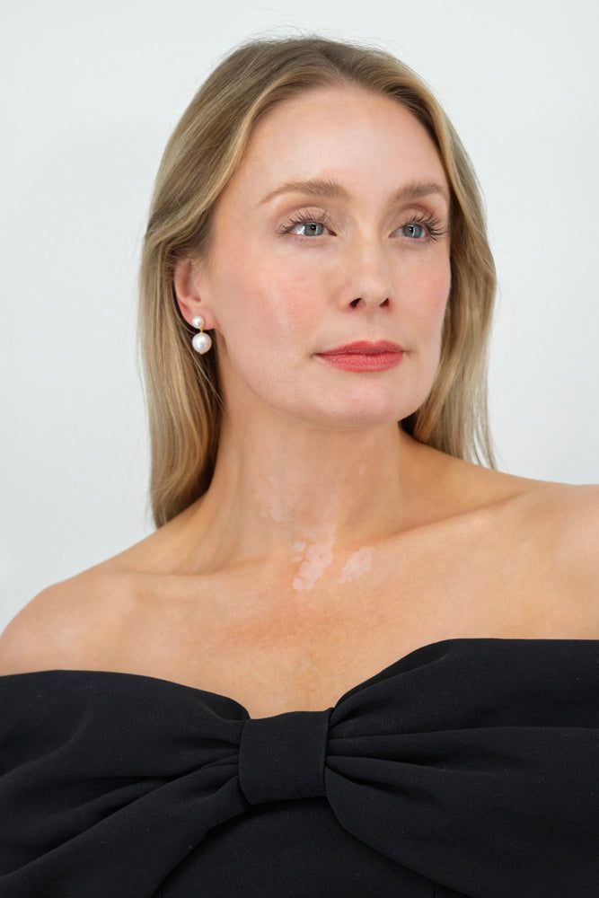 Elegant Classic Pearl Earrings styled with formal outfit – round and baroque pearl combination