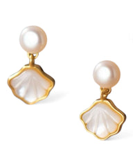 Close-up of Shellora pendant necklace with freshwater pearl drop on model