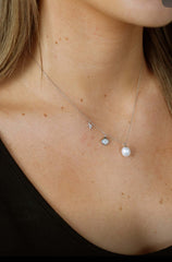Shellora sterling silver jewelry set with shell-shaped pendant and matching pearl drop earrings