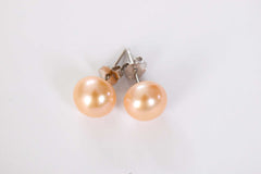 mixed color pearl studs from the queens glow collection