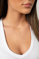 The Pearl of My Heart necklace on model – elegant pearl and gold heart jewelry for women
